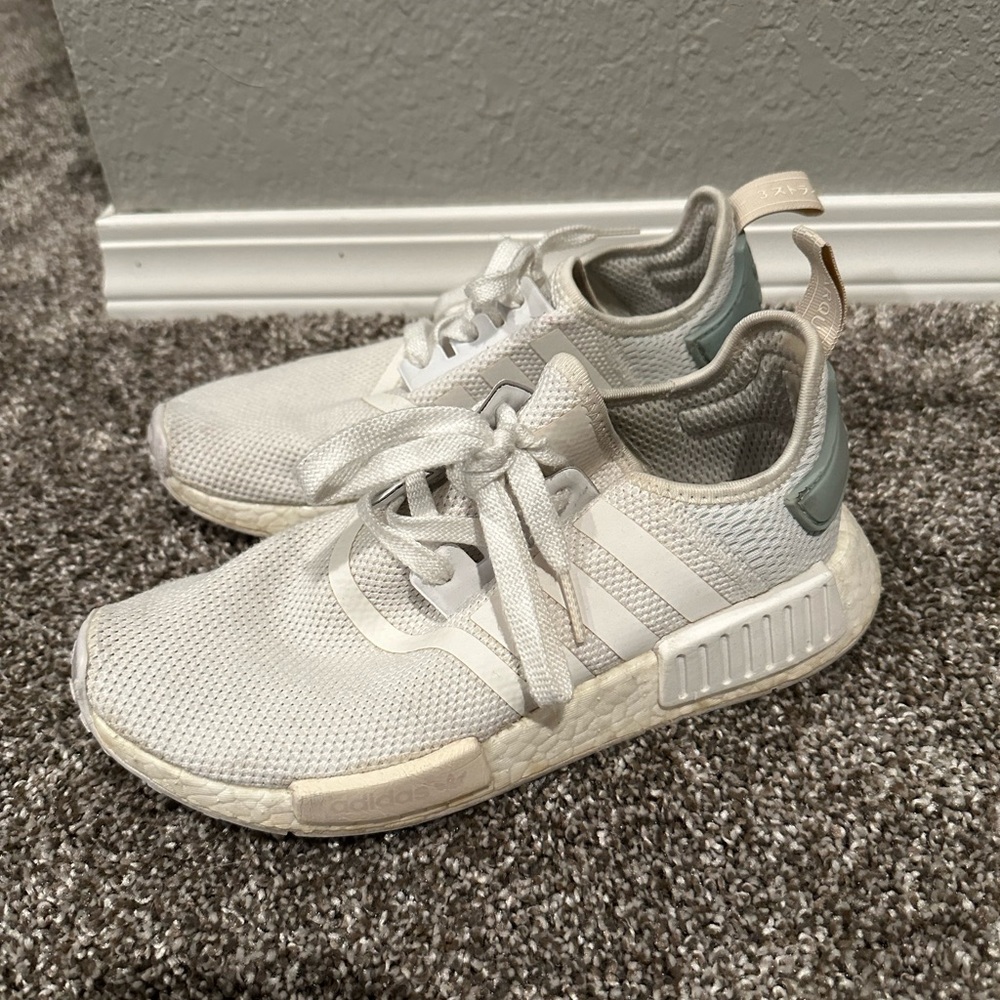 Women’s white Adidas NMDs